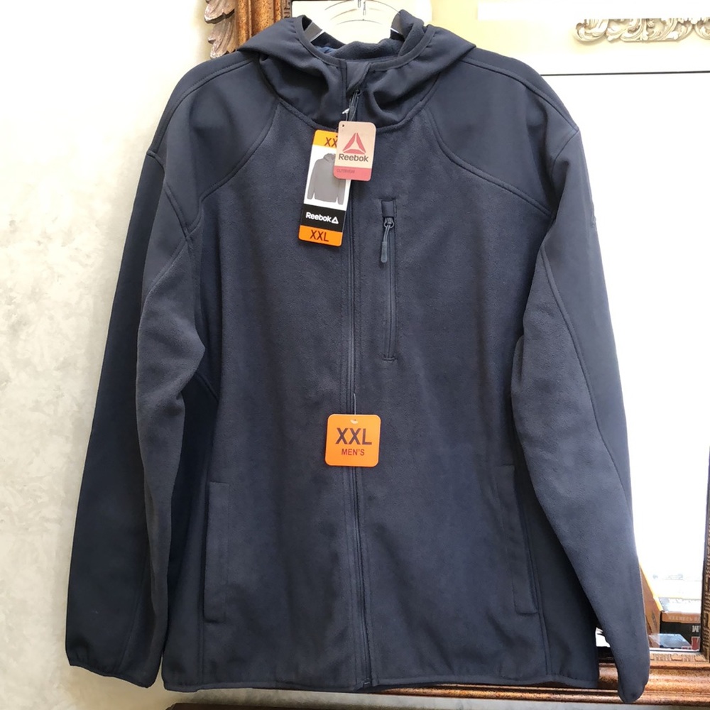 New Men’s Reebok mixed media gray jacket with hood. Size XXL.